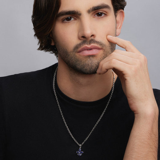 Sterling silver pendant necklace on man.