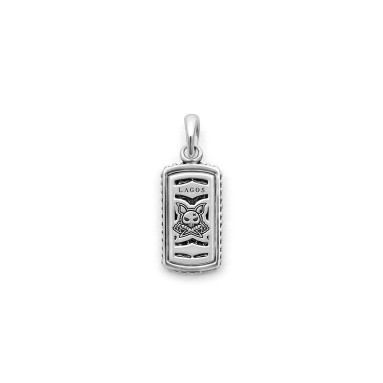 Sterling silver pendant with engraved design.