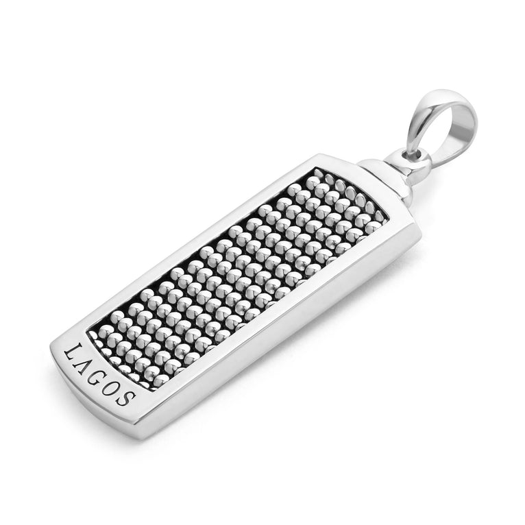Sterling silver pendant with beaded texture.