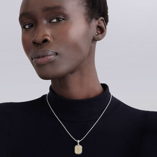 Sterling silver diamond initial necklace.