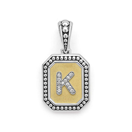 Sterling silver initial pendant with diamonds.