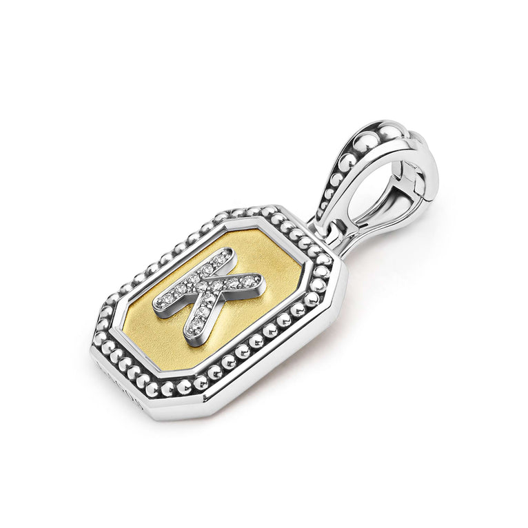 Sterling silver pendant with diamond initial.