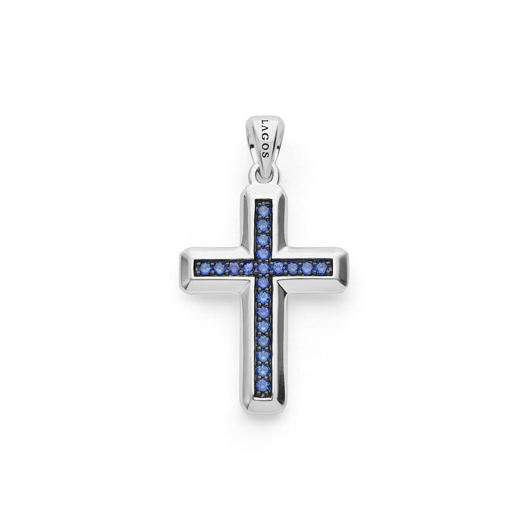 Sterling silver cross with blue sapphires.