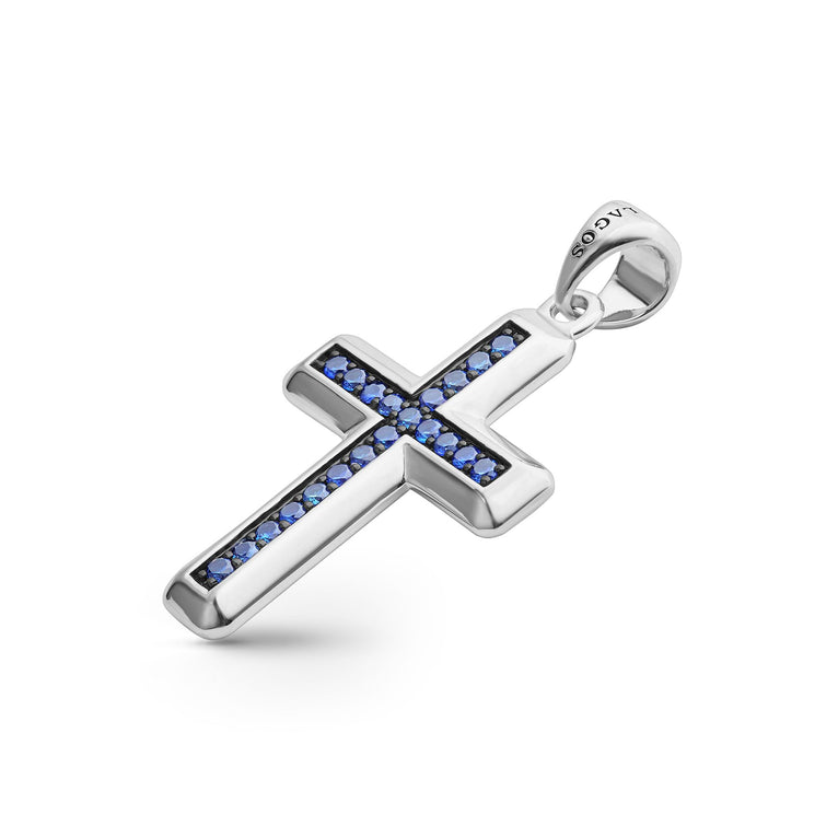 Sterling silver cross with blue sapphires.