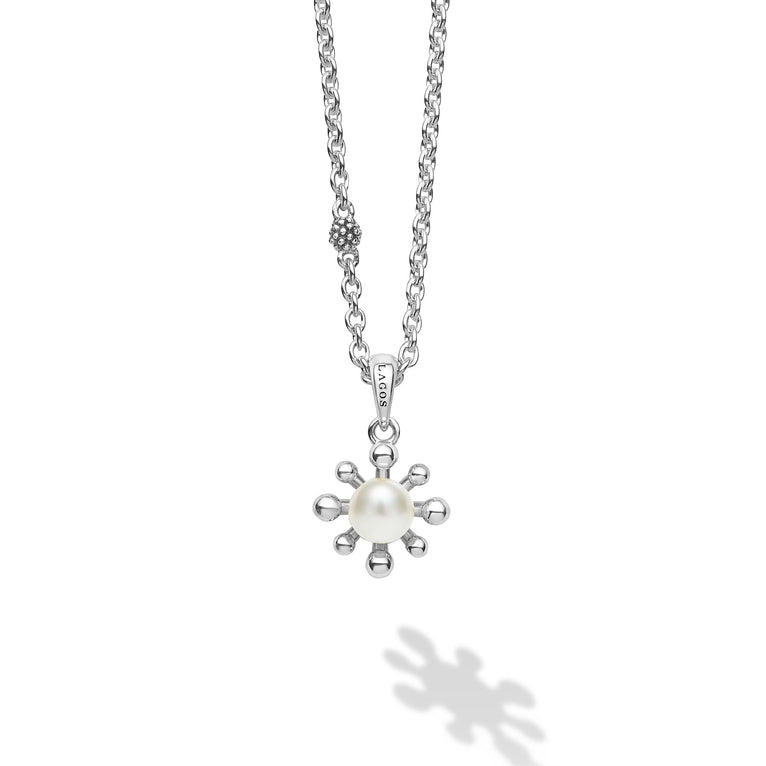 Sterling silver necklace with pearl pendant.
