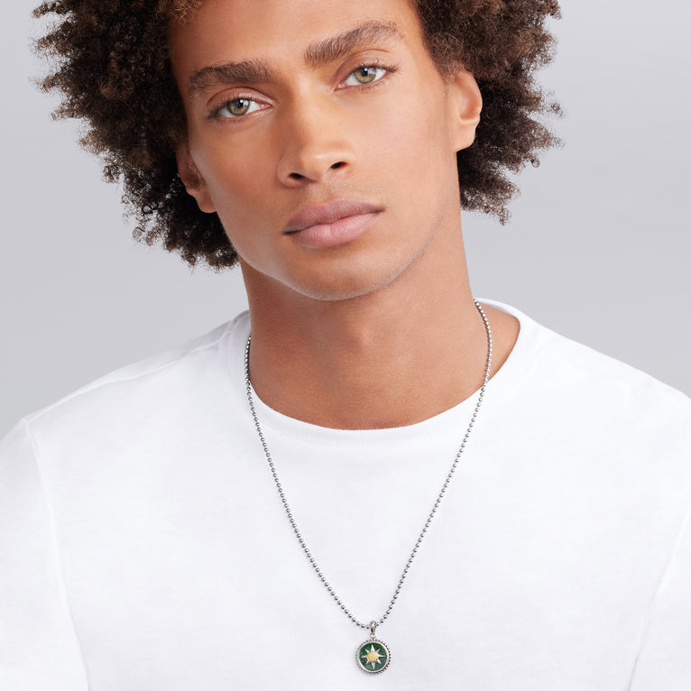 Sterling silver pendant with yellow jade.