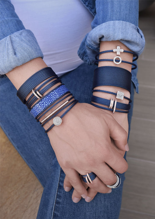Blue stainless steel cable cuff bracelet.