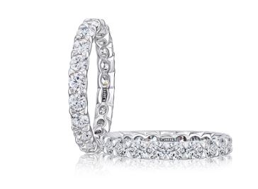 14K white gold band with round diamonds.