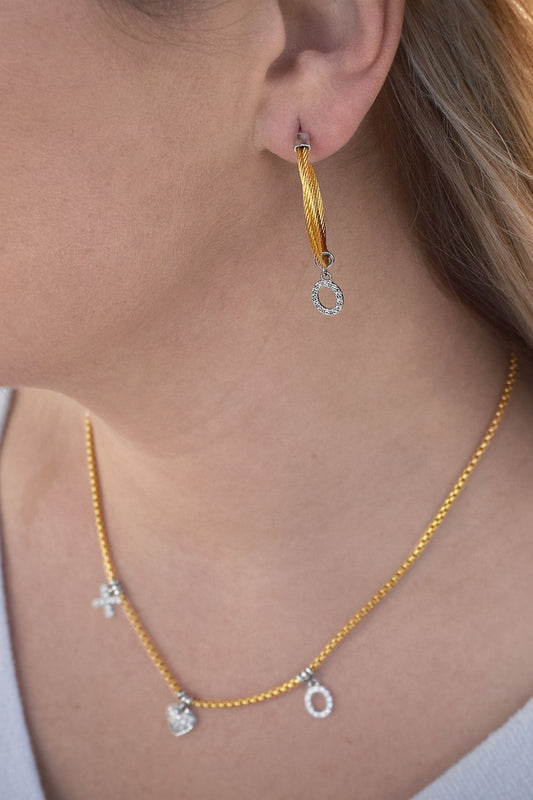 Diamond necklace with gold and silver accents.