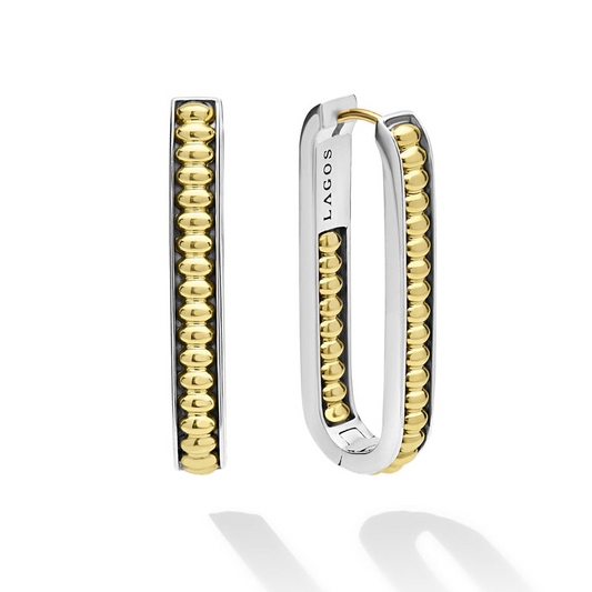 Sterling silver oval hoops with gold beading.