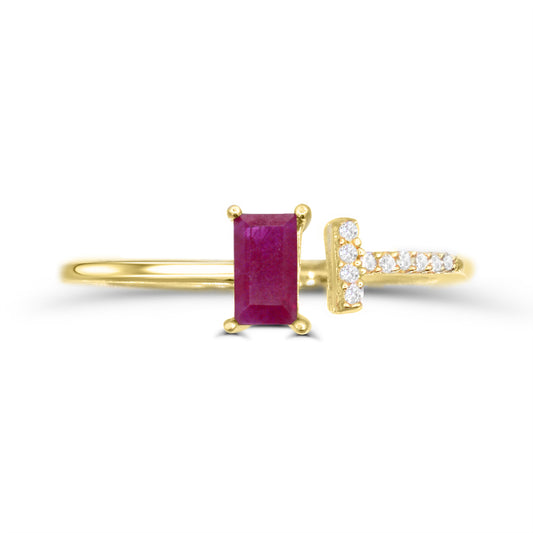 Baguette ruby ring with diamonds in gold.