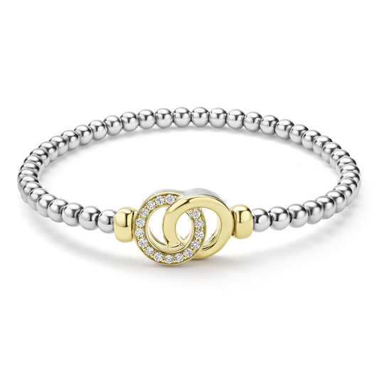 Sterling silver bracelet with gold accents.