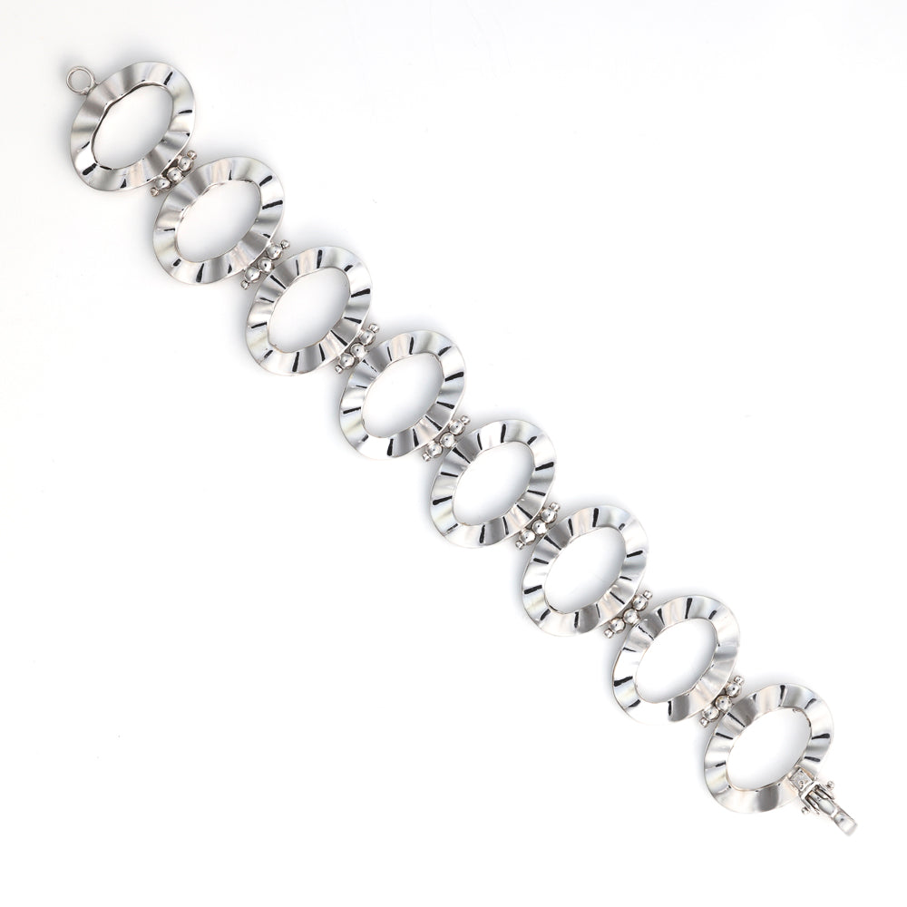14K white gold fancy link bracelet.