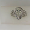 Marks Estate Dept 1 Halo Hidden Accent Natural Diamond Complete Wedding Set in 14 Karat White Gold with 1 Pear Diamond, Color: E, Clarity: SI1, totaling 0.73ctw