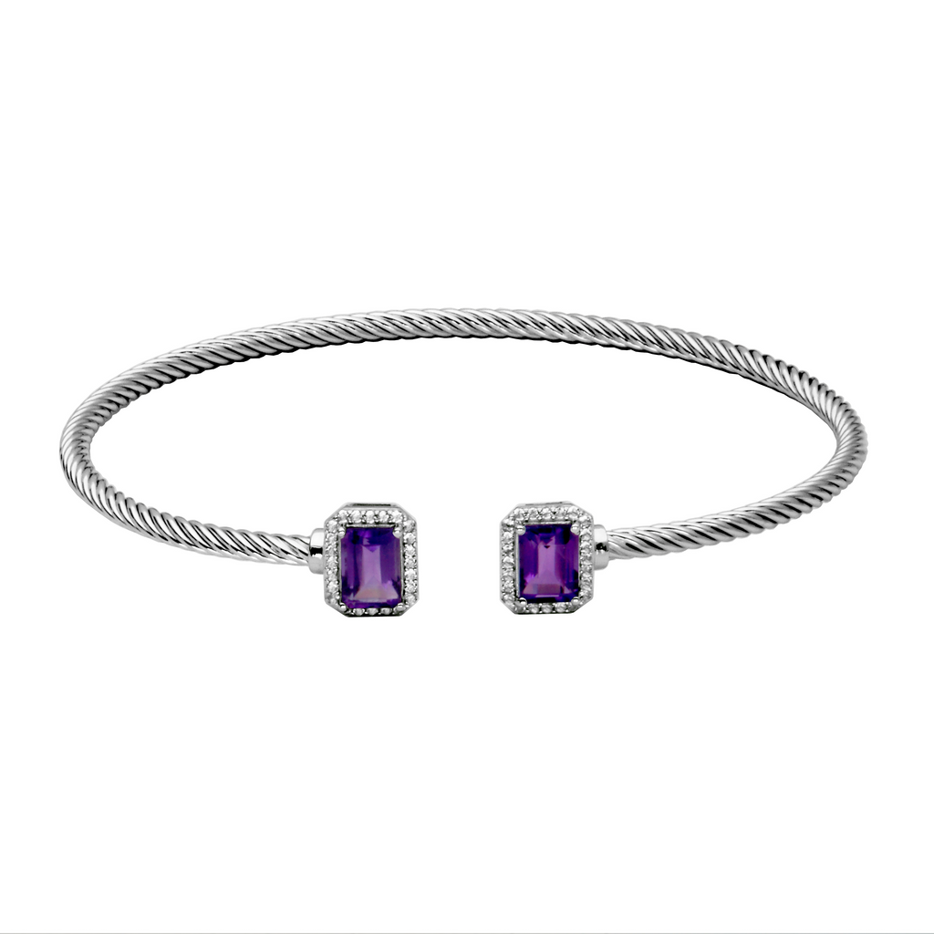 Sterling silver cuff with purple gemstones.