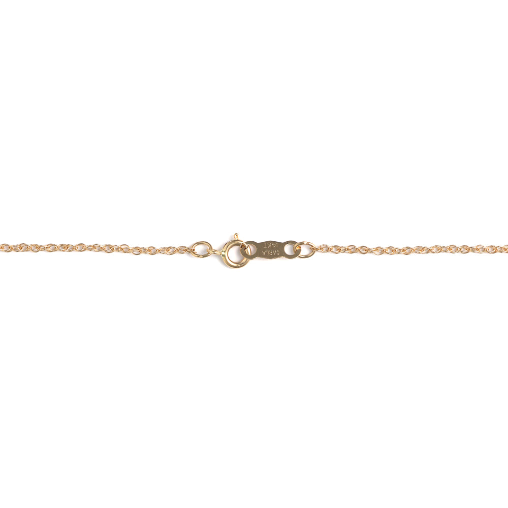 14K yellow gold necklace clasp detail.