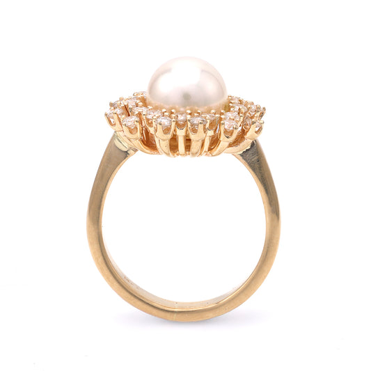 14K gold ring with pearl and diamonds.