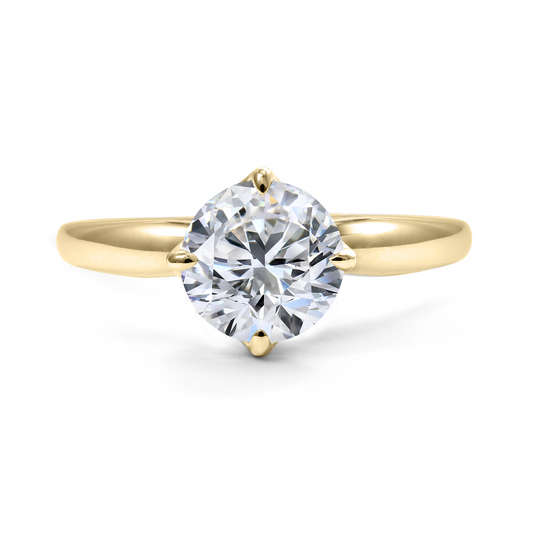 Yellow gold solitaire ring with round diamond.
