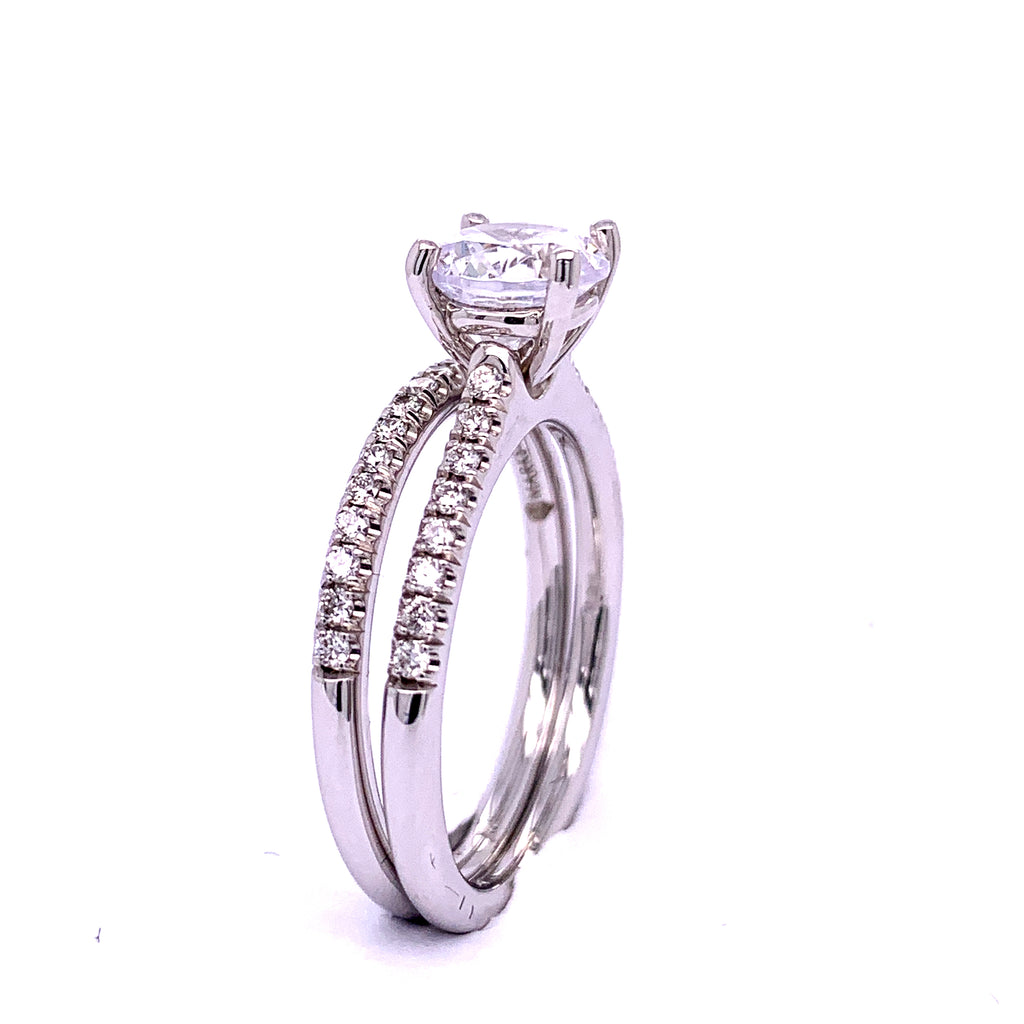 18K white gold diamond wedding set.