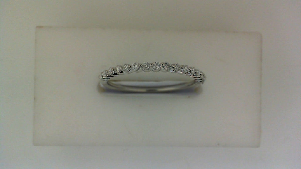 Lab-grown diamond band, white gold, round stones.
