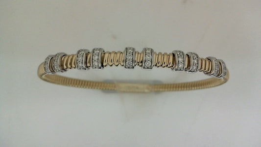Diamond bracelet with alternating gold bands.