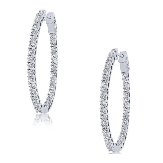 Oval hoop earrings with round diamonds.