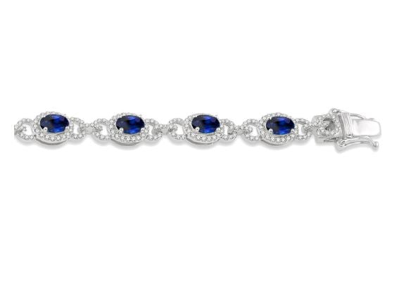Oval sapphire and diamond station bracelet.