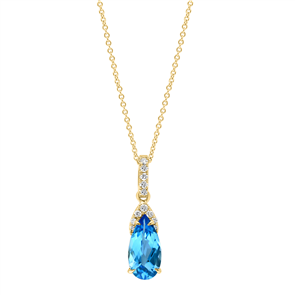 Blue topaz pendant with diamonds in gold.