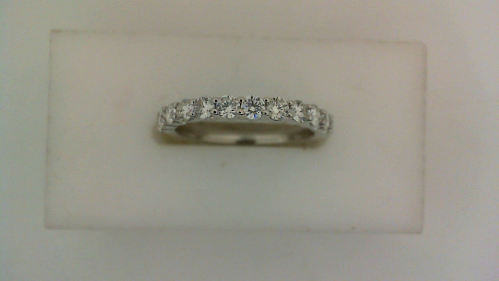 14K white gold band with round diamonds.