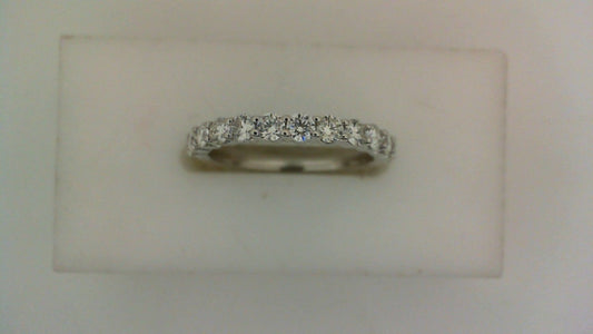 14K white gold band with round diamonds.