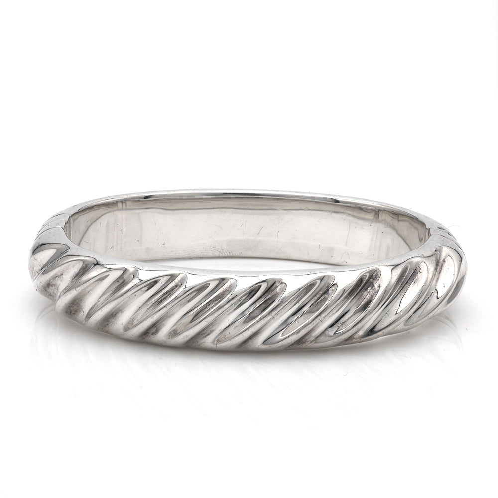 Sterling silver twisted design bangle bracelet.