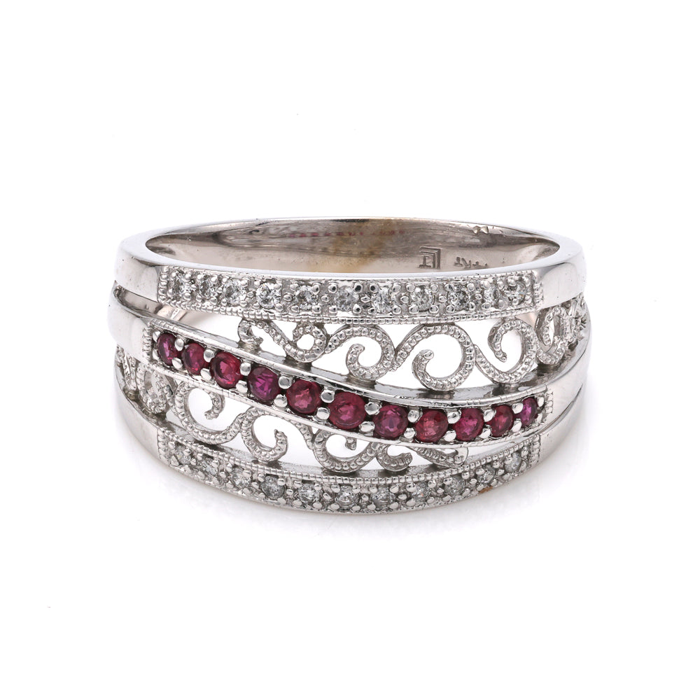 14K white gold ring with rubies.