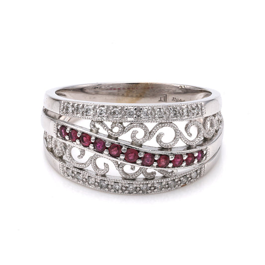 14K white gold ring with rubies.