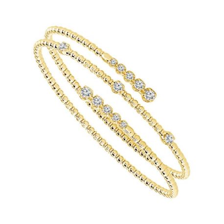 Yellow gold bracelet with round diamonds.