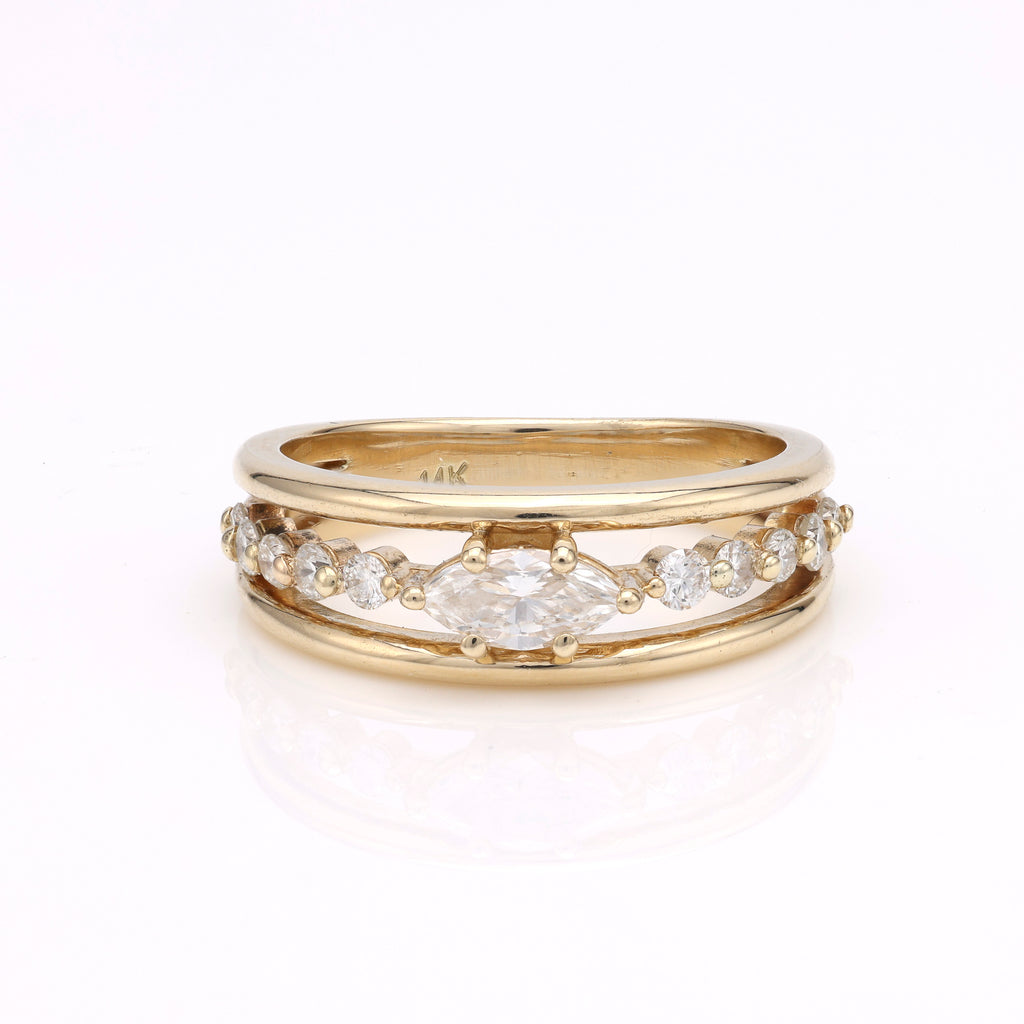 14K gold ring with marquise diamond.