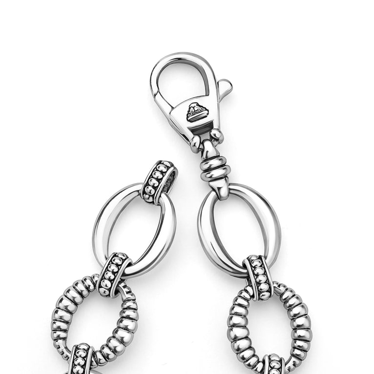 Sterling silver oval link bracelet design.