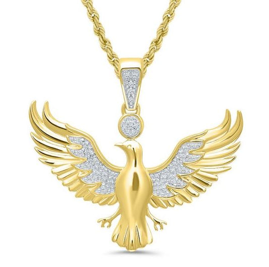 Gold eagle pendant with diamond accents.