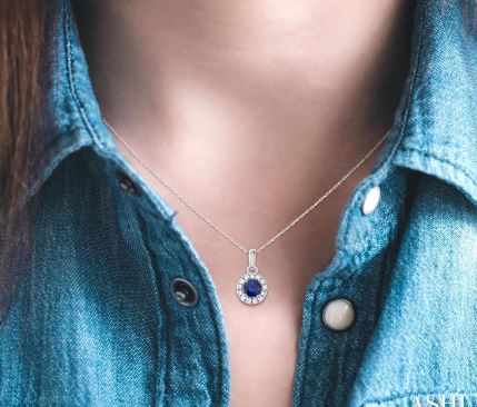 Sapphire pendant on white gold chain.