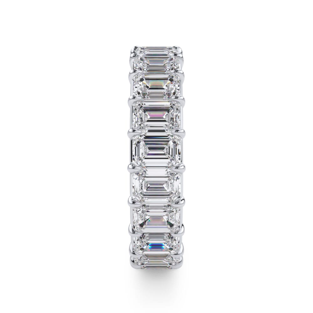 Emerald-cut diamond eternity band, white gold.