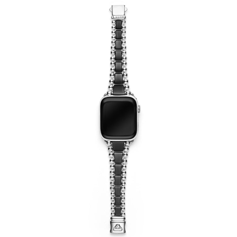 Black ceramic watch band with silver accents.