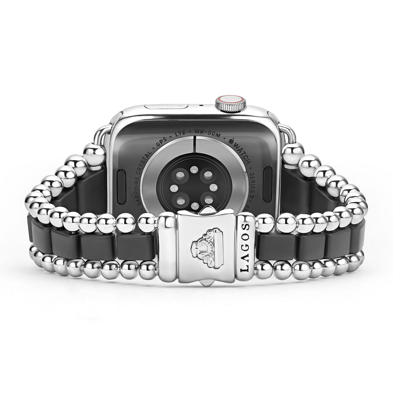 Black ceramic watch band with silver accents.