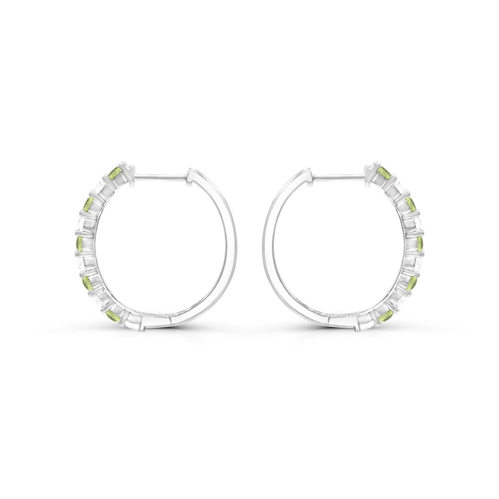 Sterling silver hoops with green peridots.
