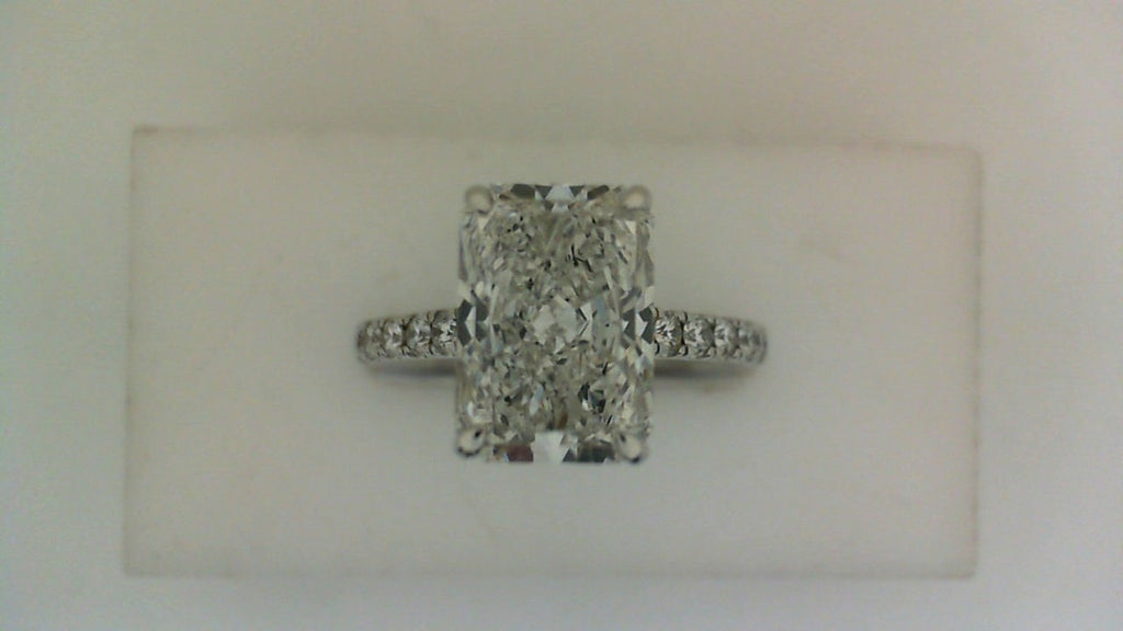 Radiant lab-grown diamond engagement ring.