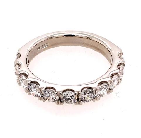 14K white gold band with round diamonds.