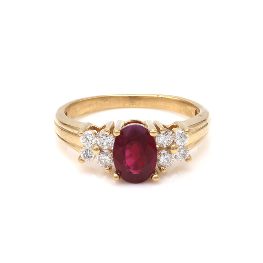 Oval ruby ring with diamonds, yellow gold.