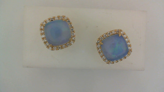 Cushion opal stud earrings with diamonds.