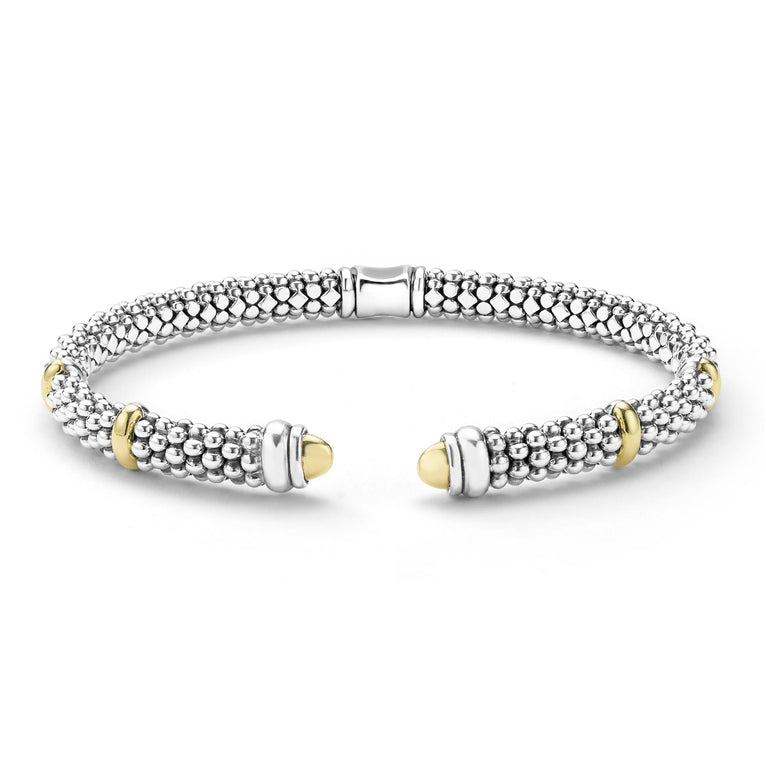 Sterling silver cuff bracelet with yellow accents.