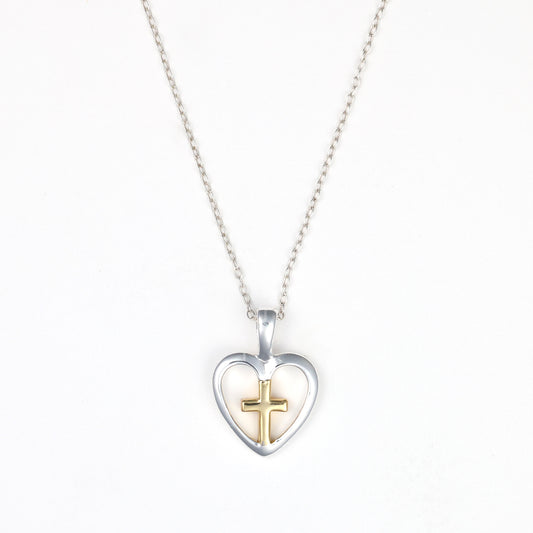 Sterling silver heart necklace with gold cross.
