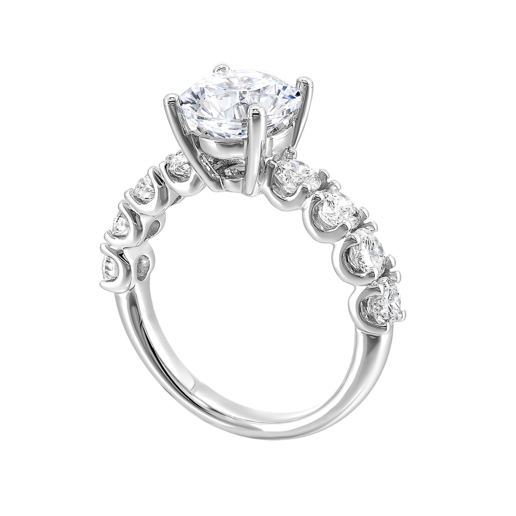 14K white gold ring with side diamonds.