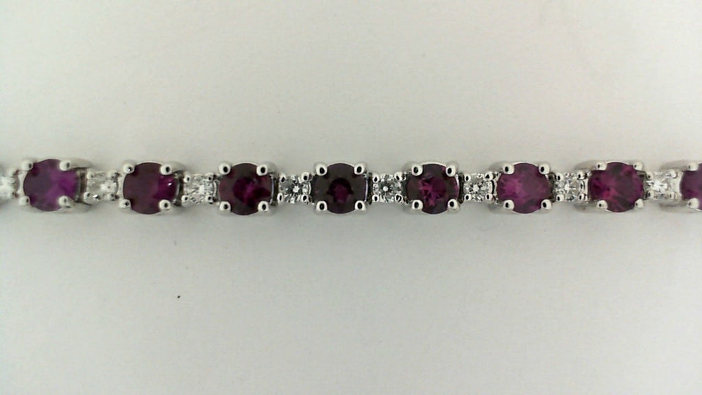 Ruby and diamond bracelet in white gold.